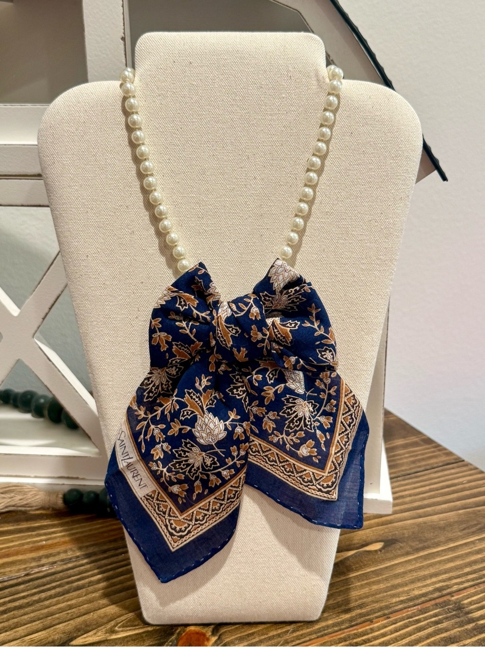 Yves Saint Laurent scarf on  Pearl Necklace